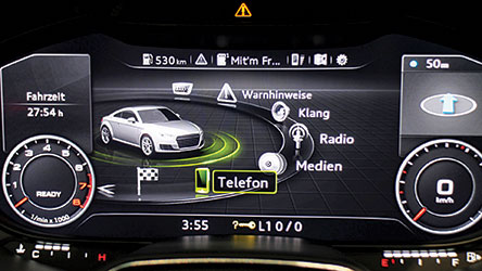 Figure 1. Automotive manufacturers are turning to customisable instrument clusters that use 2D and 3D graphics to safely present drivers with increasingly more information.(Image source: Wikimedia Commons/Robert Basic).